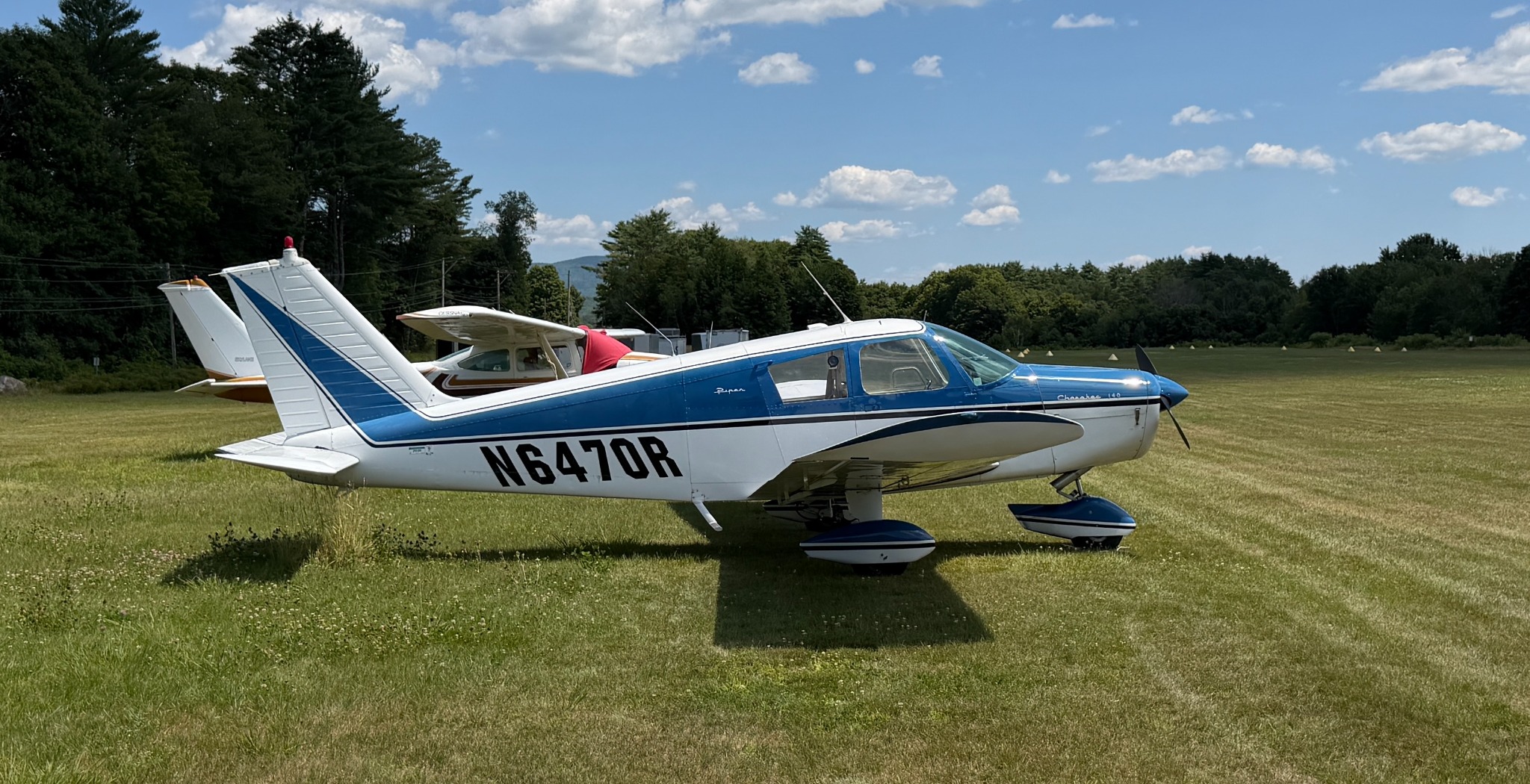 Marvelous Moe, Piper Cherokee 140 N6470R, parked on grass